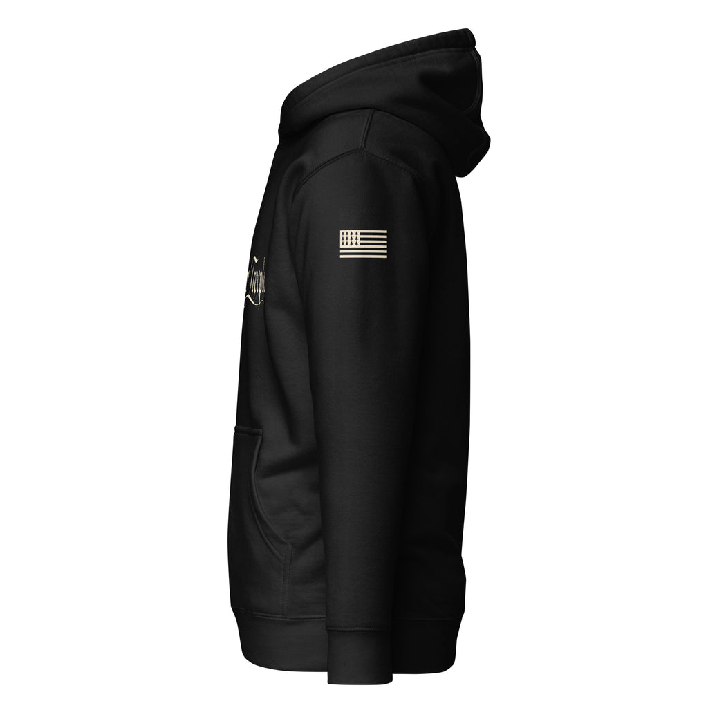 Ivory tree flag on upper left sleeve of black We the Treeple hoodie